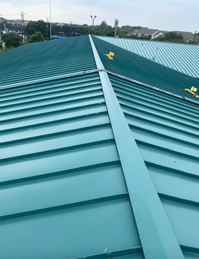 Green commercial metal roof ridge and valley for Metal Roof Repair in Sheldon