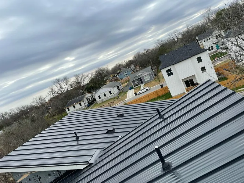 Standing seam metal roof panels with vents for Skylight Repair in Sheldon